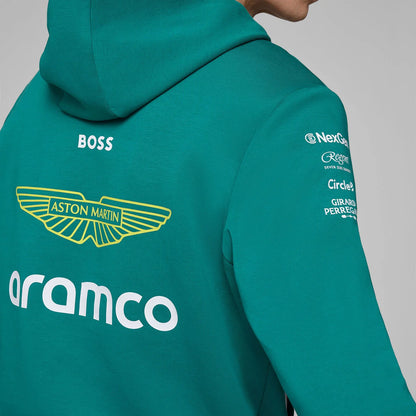 F1 fan wearing official Aston Martin F1 Team 2025 hoodie - premium motorsport apparel"