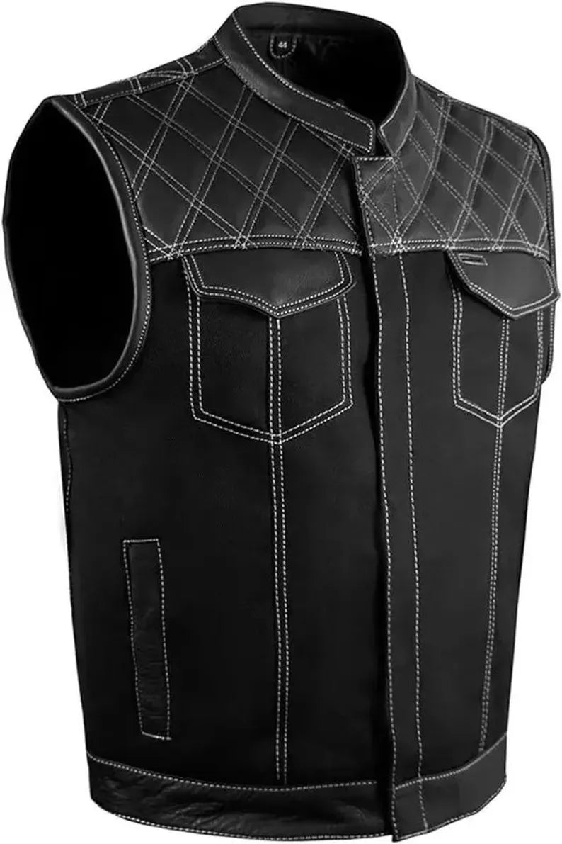 Black quilted leather vest with white stitching on a plain background