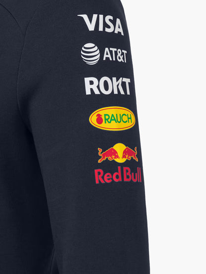 F1 fan wearing official Red Bull Racing replica hoodie - championship team apparel