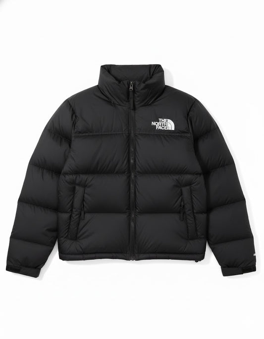 Black puffer jacket with The North Face logo on a white background