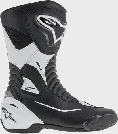 Black and white motorcycle boot with brand logo on a gray background