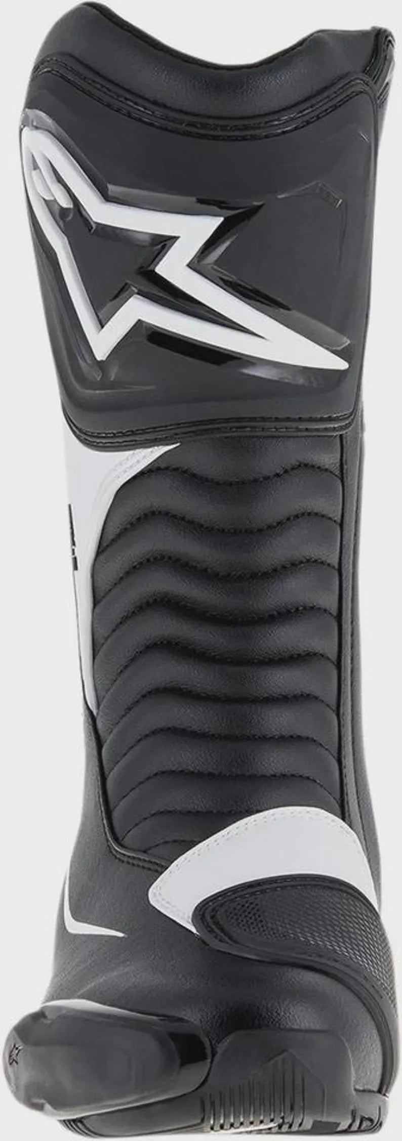 Black and white motorcycle boot with visible branding on a black background